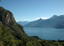 Boy hiking up mountain path to Nava Griante Lake Como